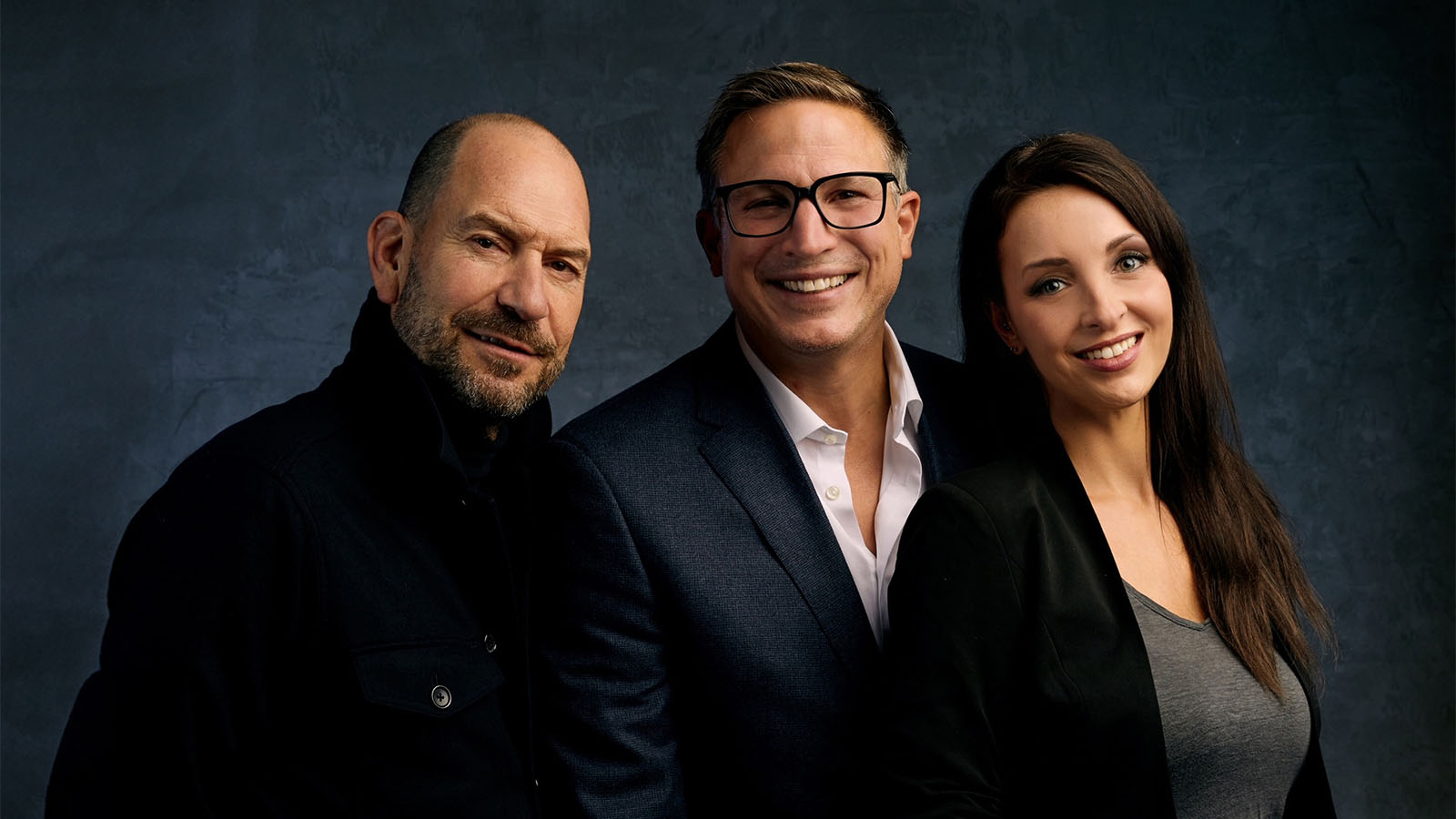 Three members of the ALPHA POOL team smiling at the camera against a dark blue background.