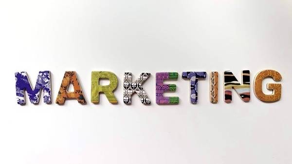 The word Marketing laid out in patterned letters on a white background.